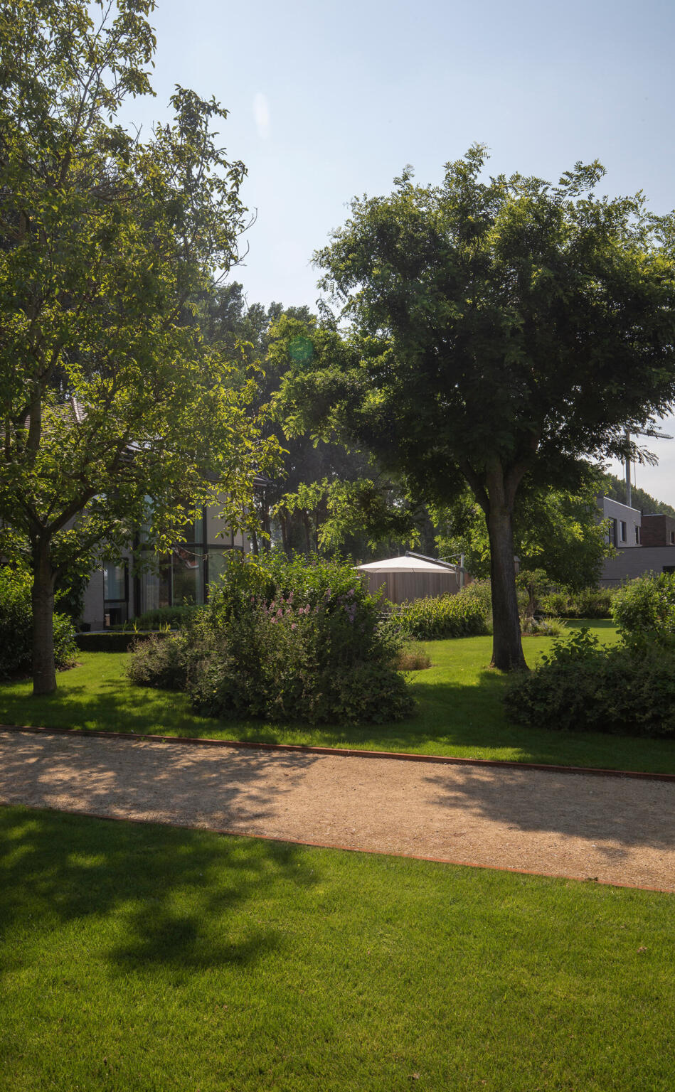 Greenarchitects stefaan willems tuinarchitect ontwerp petanque petanquebaan bomen